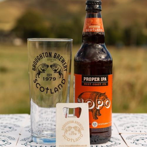Proper IPA is a west coast IPA . Pictured with a glass and bottle opener