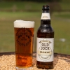 Old Jock blonde IPA in glass with bottle